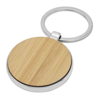 Porte-clés rond en bambou avec habillage métallique